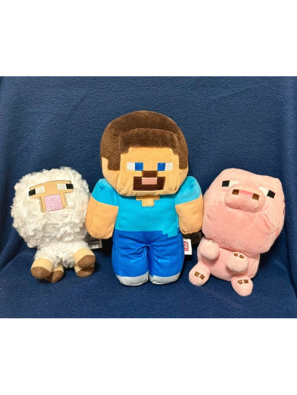 Minecraft plush toys Steve, sheep, and pig
